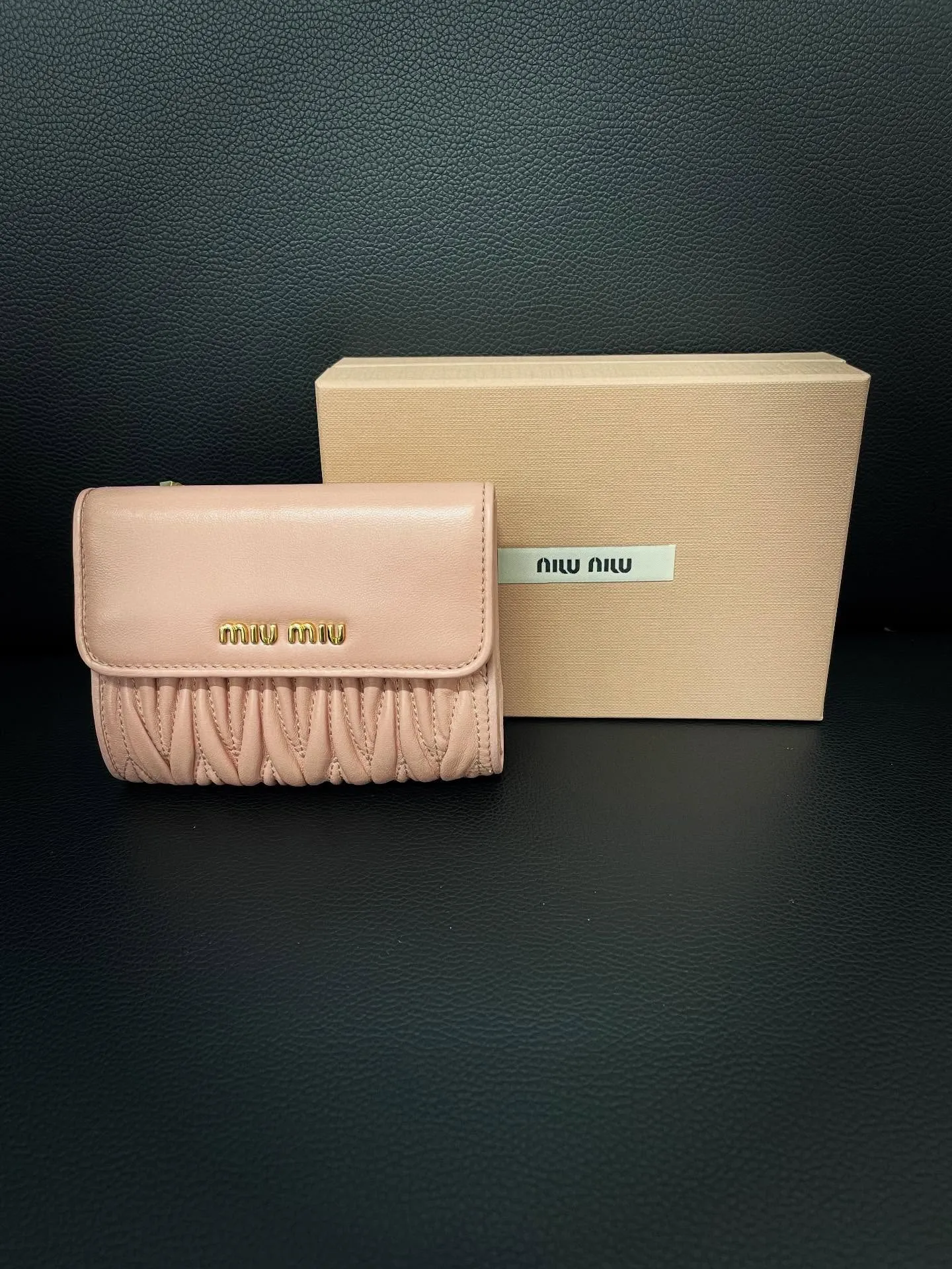 《miu miu 財布》